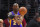 Los Angeles Lakers guard Kobe Bryant passes the ball during the first half of an NBA basketball game against the Los Angeles Clippers, Wednesday, Jan. 7, 2015, in Los Angeles. (AP Photo/Mark J. Terrill)