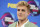 FILE - Internet personality Jake Paul arrives at the Teen Choice Awards in Los Angeles on Aug. 13, 2017. FBI agents including a SWAT team have raided the apparent home of YouTube star Jake Paul. FBI spokeswoman Laura Eimiller says agents executed a search warrant Wednesday at the Calabasas, California mansion in connection with an ongoing investigation. She could not say what the probe is about or who the target was. Helicopter video from local TV news showed agents gathering guns from the home that can frequently be seen on Paul's YouTube channel, which has over 20 million followers. (Photo by Jordan Strauss/Invision/AP, File)