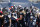 Tennessee Titans players gather before an NFL wild-card playoff football game against the Baltimore Ravens Sunday, Jan. 10, 2021, in Nashville, Tenn. (AP Photo/Wade Payne)
