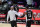 Los Angeles Clippers head coach Tyronn Lue, left, shakes hands with guard Paul George (13) during the second half of an NBA basketball game against the Chicago Bulls Sunday, Jan. 10, 2021, in Los Angeles. (AP Photo/Marcio Jose Sanchez)