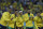 Brazil's players pose with their gold medals after the final match of the men's Olympic football tournament at Maracana stadium in Rio de Janeiro, Brazil, Saturday, Aug. 20, 2016. Brazil won the gold medal on penalty shoot-out. (AP Photo/Leo Correa)