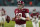 Alabama quarterback Mac Jones watches during warm ups before an NCAA College Football Playoff national championship game against Ohio State, Monday, Jan. 11, 2021, in Miami Gardens, Fla. (AP Photo/Chris O'Meara)
