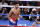 FILE - In this Nov. 2, 2019 file photo, Ryan Garcia, looks on after landing a punch to Romero Duno (not seen) during their lightweight boxing match in Las Vegas.   Garcia meets Britainâ€™s Luke Campbell, a 2012 Olympic champion, in an interim WBC lightweight title fight. The bout was postponed a month and moved from California after Campbell tested positive for COVID-19.(AP Photo/Isaac Brekken, File)