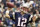 FILE - In this Sept. 30, 2001 file photo, New England Patriots quarterback Tom Brady (12) passes during Brady's first start of an NFL football game against the Indianapolis Colts in Foxborough, Mass. Six quarterbacks were taken ahead of the future first-ballot Hall of Famer Brady in 2000 before the Patriots selected him 199th overall in the sixth round of the NFL draft, forever altering the course of their franchiseâ€™s history. (AP Photo/Winslow Townson, File)