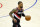 Portland Trail Blazers guard Damian Lillard dribbles during an NBA basketball game against the Los Angeles Clippers Tuesday, April 6, 2021, in Los Angeles. (AP Photo/Marcio Jose Sanchez)