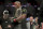 Daniel Cormier reacts after defeating Derrick Lewis by submission in the second round of a heavyweight mixed martial arts bout at UFC 230, early Sunday, Nov. 4, 2018, at Madison Square Garden in New York. (AP Photo/Julio Cortez)