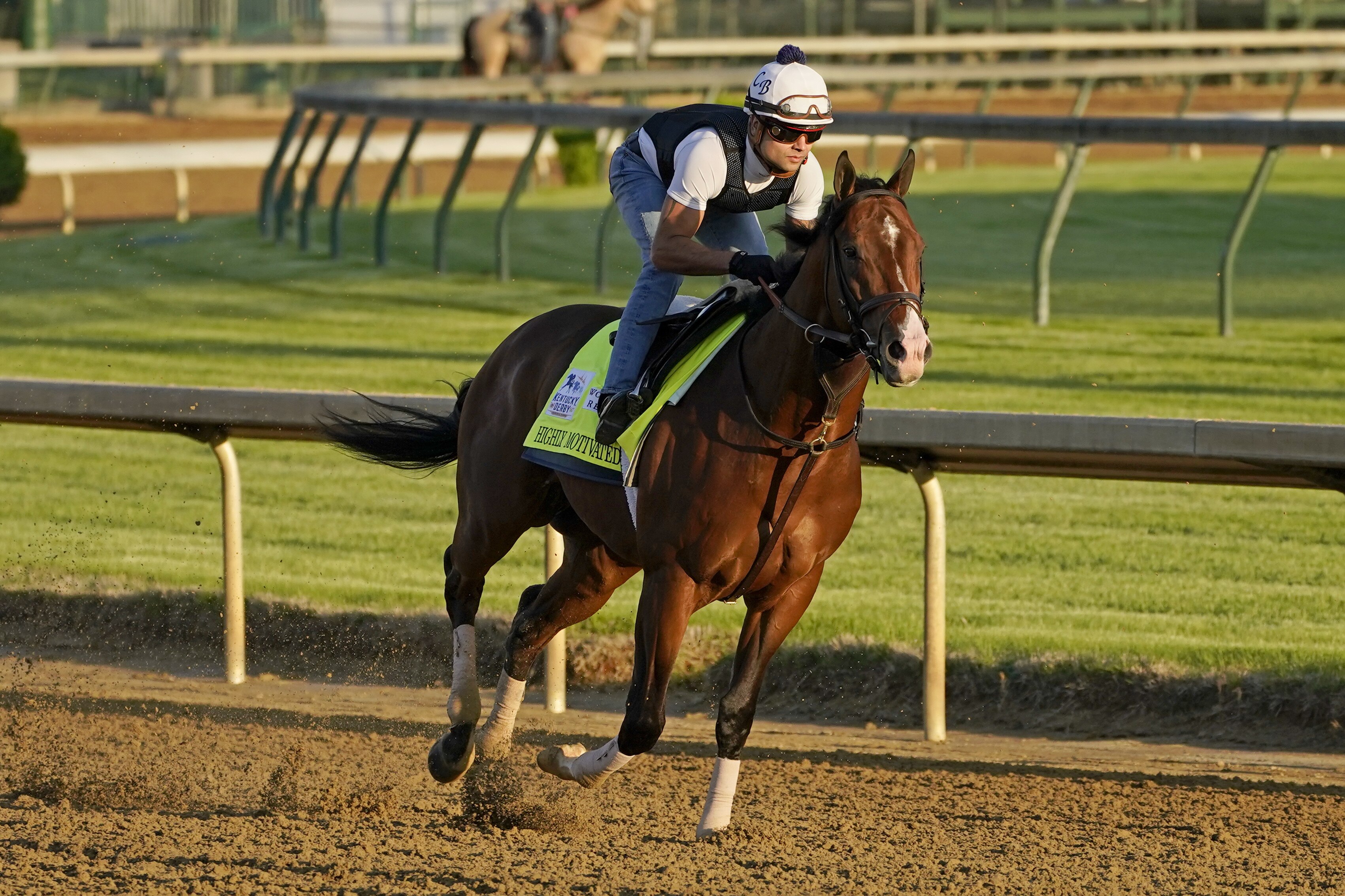 Kentucky Derby hopeful Highly Motivated works out at Churchill Downs Tuesday, April 27, 2021, in Louisville, Ky. The 147th running of the Kentucky Derby is scheduled for Saturday, May 1. (AP Photo/Charlie Riedel)
