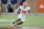 American Team wide receiver Cornell Powell of Clemson (14) runs the ball during the second half of the NCAA college football Senior Bowl in Mobile, Ala, Saturday, Jan. 30, 2021. (AP Photo/Rusty Costanza)