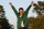 Hideki Matsuyama, of Japan, celebrates after putting on the champion's green jacket after winning the Masters golf tournament on Sunday, April 11, 2021, in Augusta, Ga. (AP Photo/Gregory Bull)