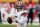 FILE - Cleveland Browns quarterback Baker Mayfield throws during the second half of an NFL divisional round football game against the Kansas City Chiefs in Kansas City, Mo., in this Sunday, Jan. 17, 2021, file photo. The Browns exercised the fifth-year option on quarterback Baker Mayfield's rookie contract, an expected move after his strong 2020 season. (AP Photo/Charlie Riedel, File)