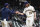 Milwaukee Brewers manager Craig Counsell takes starter Corbin Burnes out of the game during the sixth inning of a baseball game against the Miami Marlins Monday, April 26, 2021, in Milwaukee. (AP Photo/Morry Gash)