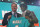 Alabama wide receiver Jaylen Waddle, right, holds a team jersey with NFL Commissioner Roger Goodell after being chosen by the Miami Dolphins with the sixth pick in the NFL football draft Thursday April 29, 2021, in Cleveland. (AP Photo/Tony Dejak)