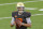 National Team quarterback Ian Book of Notre Dame (12) throws during the NCAA Senior Bowl college football game in Mobile, Ala., Saturday, Jan. 30, 2021. (AP Photo/Matthew Hinton)