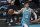 Charlotte Hornets guard LaMelo Ball passes against Detroit in the first half of an NBA basketball game in Charlotte, N.C., Saturday, May 1, 2021. (AP Photo/Nell Redmond)