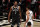 Brooklyn Nets forward Kevin Durant (7) talks to Milwaukee Bucks forward Giannis Antetokounmpo (34) during an NBA basketball game Monday, Jan. 18, 2021, in New York. The Nets won 123-125. (AP Photo/Adam Hunger)
