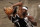 Milwaukee Bucks guard Jrue Holiday (21) defends Brooklyn Nets forward Kevin Durant (7) during an NBA basketball game Monday, Jan. 18, 2021, in New York. The Nets won 123-125. (AP Photo/Adam Hunger)