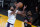 Los Angeles Lakers forward Anthony Davis (3) grabs a rebound next to Phoenix Suns center Deandre Ayton (22) during the second half of an NBA basketball game Sunday, May 9, 2021, in Los Angeles. (AP Photo/Marcio Jose Sanchez)