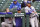 Los Angeles Dodgers' Max Muncy, left, manager Dave Roberts, center, and Justin Turner watches during the third inning of a baseball game against the Chicago Cubs in Chicago, Wednesday, May 5, 2021. (AP Photo/Nam Y. Huh)
