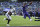 FILE - In this Nov. 25, 2018, file photo, Baltimore Ravens quarterback Lamar Jackson (8) scores a touchdown in front of Oakland Raiders linebacker Jason Cabinda during the second half of an NFL football game in Baltimore. With Jackson poised for his possible first road start, the Ravens will look for their third straight win when they face the Atlanta Falcons, who have lost three straight, on Sunday. (AP Photo/Nick Wass, File)