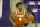 Texas forward Greg Brown (4) dribbles the ball up the court against TCU during the first half of an NCAA college basketball game in Fort Worth, Texas, Sunday, March 7, 2021. (AP Photo/Michael Ainsworth)
