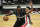 Milwaukee Bucks' Bobby Portis (9) drives to the basket against Houston Rockets' Anthony Lamb during the second half of an NBA basketball game Friday, May 7, 2021, in Milwaukee. (AP Photo/Aaron Gash)