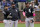 Chicago White Sox manager Tony La Russa, center, stands with Nick Madrigal, left, and Yoan Moncada, right, as he makes a pitching change during the sixth inning of a baseball game against the Kansas City Royals Sunday, May 9, 2021, in Kansas City, Mo. (AP Photo/Charlie Riedel)