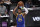 Golden State Warriors forward Kent Bazemore (26) in action during the second half of an NBA basketball game against the Washington Wizards, Wednesday, April 21, 2021, in Washington. (AP Photo/Nick Wass)
