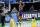 LSU guard Cameron Thomas (24) shoots over Michigan guard Eli Brooks (55) during the first half of a second-round game in the NCAA men's college basketball tournament at Lucas Oil Stadium Monday, March 22, 2021, in Indianapolis. (AP Photo/AJ Mast)