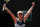 Czech Republic's Barbora Krejcikova raises her arms as she defeats United States's Coco Gauff during their quarterfinal match of the French Open tennis tournament at the Roland Garros stadium Wednesday, June 9, 2021 in Paris. Krejcikova won 7-6, 6-3. (AP Photo/Thibault Camus)