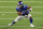 FILE - In this Sept. 14, 2020, file photo, New York Giants running back Saquon Barkley carries the ball during the third quarter against the Pittsburgh Steelers in an NFL football game in East Rutherford, N.J. The Giants picked up the fifth-year option on the rookie contract for Barkley. The 2018 Offensive Rookie of the Year is recovering from a torn right ACL in Week 2 of last season. (AP Photo/Seth Wenig, File)