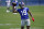 New York Giants wide receiver Kenny Golladay (19) passes the ball back to an assistant while running through light drills during an NFL football practice with the team, Thursday, June 10, 2021, in East Rutherford, N.J. (AP Photo/Kathy Willens)