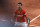 Serbia's Novak Djokovic celebrates defeating Stefanos Tsitsipas of Greece in their final match of the French Open tennis tournament at the Roland Garros stadium Sunday, June 13, 2021 in Paris. Djokovic won 6-7, 2-6, 6-3, 6-2, 6-4. (AP Photo/Thibault Camus)