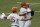 Texas pitcher Aaron Nixon, right, hugs catcher Silas Ardoin as they celebrate the team's win over South Florida in an NCAA Super Regional college baseball game, Sunday, June 13, 2021, in Austin, Texas. (AP Photo/Eric Gay)