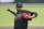 Vanderbilt pitcher Kumar Rocker throws against East Carolina during the first inning of an NCAA college baseball super regional game Friday, June 11, 2021, in Nashville, Tenn. (AP Photo/Mark Humphrey)