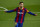 Barcelona's Lionel Messi celebrates after scoring the opening goal during the Spanish La Liga soccer match between FC Barcelona and Getafe at the Camp Nou stadium in Barcelona, Spain, Thursday, April 22, 2021. (AP Photo/Joan Monfort)