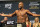 UFC fighter Rashad Evans extends his arms during the weigh in for UFC 192, Friday, Oct. 2, 2015 in Houston. (AP Photo/Juan DeLeon)