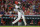 Cincinnati Reds' Nick Castellanos hits a grand slam during the seventh inning of a baseball game against the Philadelphia Phillies in Cincinnati, Monday, June 28, 2021. (AP Photo/Aaron Doster)