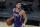 Phoenix Suns guard Devin Booker (1) during the first half of an NBA basketball game against the San Antonio Spurs in San Antonio, Saturday, May 15, 2021. (AP Photo/Eric Gay)