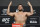 LAS VEGAS, NEVADA - JULY 09: Tai Tuivasa of Australia poses on the scale during the UFC 264 official weigh-in at UFC APEX on July 09, 2021 in Las Vegas, Nevada. (Photo by Jeff Bottari/Zuffa LLC)