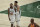 Milwaukee Bucks forward Khris Middleton celebrates with teammate forward Giannis Antetokounmpo, right, at the end of Game 4 against the Phoenix Suns in basketball's NBA Finals Wednesday, July 14, 2021, in Milwaukee. (AP Photo/Aaron Gash)