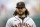 San Francisco Giants shortstop Brandon Crawford (35) walks to the dugout before the first baseball game of a doubleheader, Saturday, June 12, 2021, in Washington. This game is a makeup of a postponed game from Thursday. (AP Photo/Nick Wass)