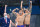 USA's Bowen Becker, Blake Pieroni and Caeleb Dressel celebrate as USA's Zach Apple touched in first to win and take gold in the final of the men's 4x100m freestyle relay swimming event during the Tokyo 2020 Olympic Games at the Tokyo Aquatics Centre in Tokyo on July 26, 2021. (Photo by Jonathan NACKSTRAND / AFP) (Photo by JONATHAN NACKSTRAND/AFP via Getty Images)