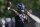 Baltimore Ravens quarterback Lamar Jackson works out during the team's NFL football training, Tuesday, June 15, 2021, in Owings Mills, Md. (AP Photo/Julio Cortez)