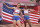 Sydney Mclaughlin, left, and Dalilah Muhammad, both of the United States, celebrate after finishing first and second respectively in the women's 400m hurdles final during the 2020 Summer Olympics on Wednesday, Aug. 4, 2021, in Tokyo, Japan . (Andrej ISAKOVIC / POOL / AFP)
