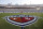 FILE - In this Oct. 10, 2020, file photo, The Red River Showdown logo is displayed on the field of the Cotton Bowl, prior to an NCAA college football game between the University of Texas and Oklahoma, in Dallas. Texas and Oklahoma made a request Tuesday, July 27, 2021, to join the Southeastern Conference — in 2025 —- with SEC Commissioner Greg Sankey saying the league would consider it in the “near future.” (AP Photo/Michael Ainsworth, File)