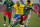 Brazil's Richarlison (10) and Mexico's Jesus Angulo (4) battle for the ball during a men's soccer semifinal match at the 2020 Summer Olympics, Tuesday, Aug. 3, 2021, in Kashima, Japan. (AP Photo/Andre Penner)