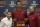 Cleveland Cavaliers first round draft selection, Evan Mobley is flanked by Cavs GM Koby Altman, left, and head coach J.B. Bickerstaff during a news conference at the Cavaliers training facility in Independence, Ohio, Friday, July 30, 2021. Mobley was the third selection of the draft. (AP Photo/Phil Long)