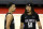 LAS VEGAS, NEVADA - AUGUST 09:  Jalen Suggs #4 and Cole Anthony #50 of the Orlando Magic talk on the court during a break in their game against the Golden State Warriors during the 2021 NBA Summer League at the Thomas & Mack Center on August 9, 2021 in Las Vegas, Nevada. The Magic defeated the Warriors 91-89 in overtime. NOTE TO USER: User expressly acknowledges and agrees that, by downloading and or using this photograph, User is consenting to the terms and conditions of the Getty Images License Agreement.  (Photo by Ethan Miller/Getty Images)
