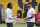 Pittsburgh Steelers running back and first round pick Najee Harris, left, hands a football to quarterback Ben Roethlisberger during the team's NFL mini-camp football practice in Pittsburgh, Tuesday, June 15, 2021. (AP Photo/Gene J. Puskar)
