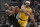 Milwaukee Bucks' George Hill is fouled by Los Angeles Lakers' Jared Dudley during the first half of an NBA basketball game Thursday, Dec. 19, 2019, in Milwaukee. (AP Photo/Morry Gash)